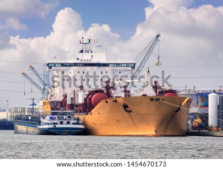 Moored tanker at embankment of an oil refinery,  Port of Antwerp, Belgium