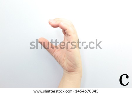 American sign language Of  letter "C" on white background.