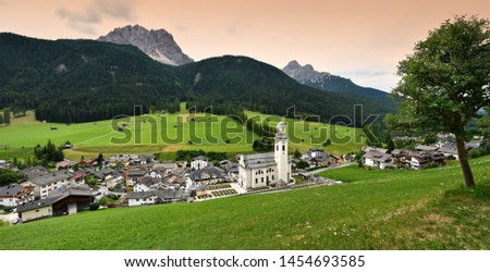 Sesto-Sexten with his Church during summer season. Val Pusteria, Dolomites. South Tyrol in Italy. Royalty-Free Stock Photo #1454693585