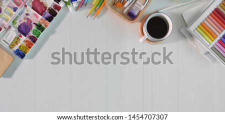 Artist workspace color on white wood table and copy space