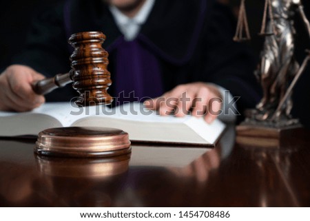Judge striking gavel. Law and justice concept.