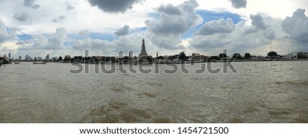 Panorama view of Chao Phraya river and Temple of Dawn (Wat Arun Ratchawararam), Bangkok, Thailand, Southeast Asia. The picture was taken in October 2017.