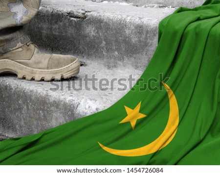 Military concept on the background of the flag of Mauritania