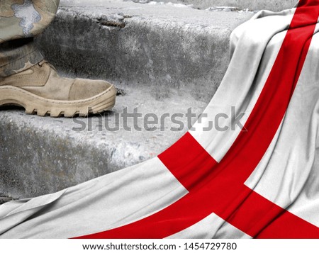 Military concept on the background of the flag of England