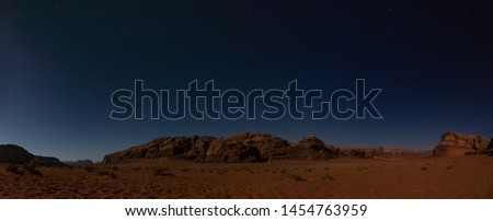 A panorama picture of the sky at night over one of Wadi Rum's camps.