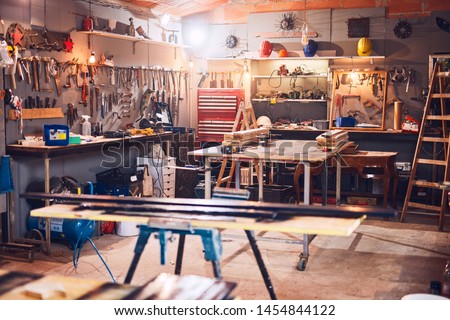 Retro / vintage workshop with misc. tools. Royalty-Free Stock Photo #1454844122