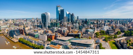Aerial panoramic cityscape view of London and the River Thames, England, United Kingdom. Close up view of the city of London district.