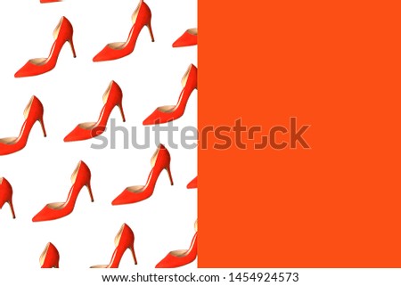 Female red shoes pattern on white and coral red background, isolated. Party, Valentine's Day, Christmas, Happy New Year, sale, Black Friday, wedding outfit conception. Flat lay, top view, copy space.