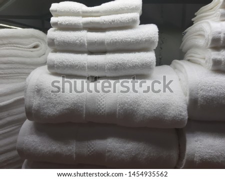 White towels are on the shelves