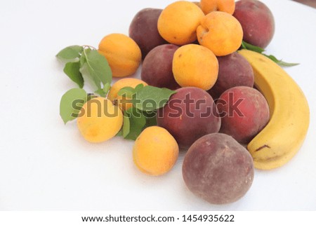 Peaches And Apricot With the banana Fruits Fresh Isolated On white
