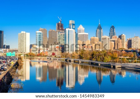 Philadelphia, Pennsylvania, USA downtown skyline at dusk on the Schuylkill River.