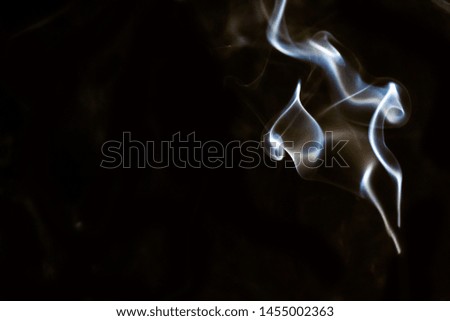 abstract smoke line movement with white light effect on black background