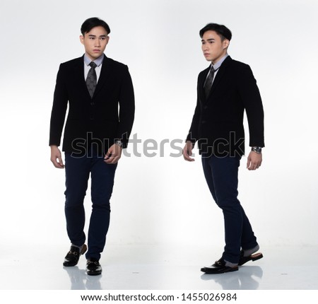 Full Length Snap Figure, Asian 20s Business Man Stand in dark Black proper Suit pants and shoes, studio lighting white background isolated collage group pack shot, Young adult Male happy smile smart