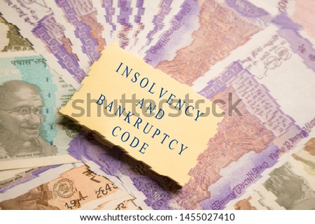 Concept of Insolvency and Bankruptcy Code or law on Indain currency Notes. Royalty-Free Stock Photo #1455027410