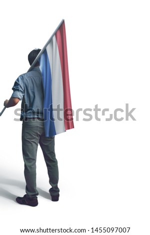 Young man holding Netherlands Flag in White Background, Flag of Netherlands