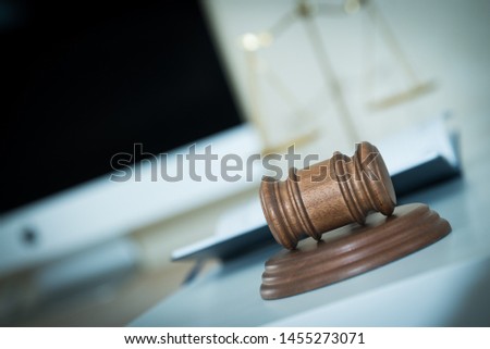 Lawyer businessman working or reading lawbook in office workplace for consultant lawyer concept.