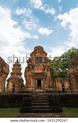 Khmer Castle in Thailand Made of large brown-orange stones arranged together and carved into beautiful architecture.(Prasat Sikhoraphum, Surin, Thailand)
