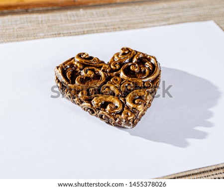 
Handmade heart shaped gold color, isolated