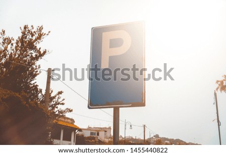 parking sign in warm sunlight