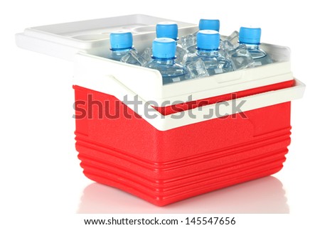 Traveling refrigerator with bottles of water and ice cubes, isolated on white