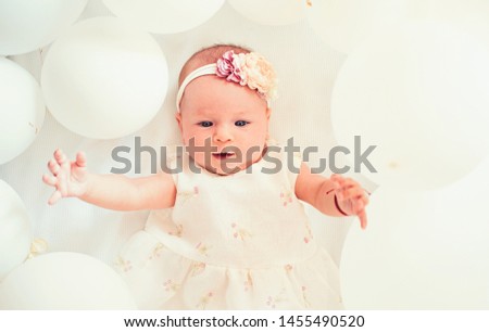 My sweet baby. Family. Child care. Childrens day. Small girl. Happy birthday. Childhood happiness. Portrait of happy little child in white balloons. Sweet little baby. New life and birth.