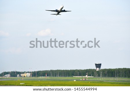 Airplane taking off from the airport. Natural photo.