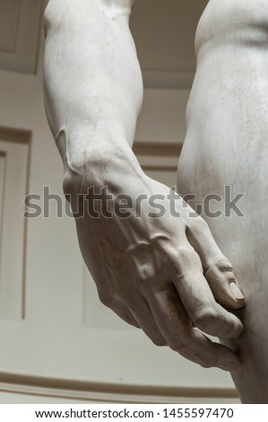 Vertical close up view of David's hand details.  Sculpture done by famous Italian sculptor Michelangelo Royalty-Free Stock Photo #1455597470