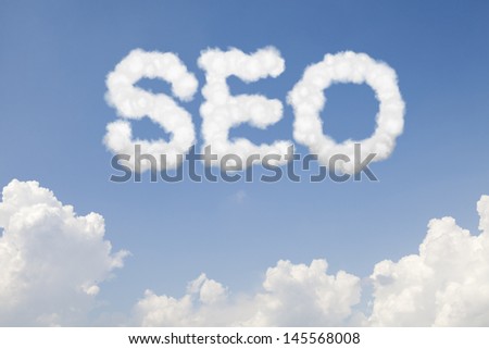SEO search engine optimization concept text word in clouds on blue sky