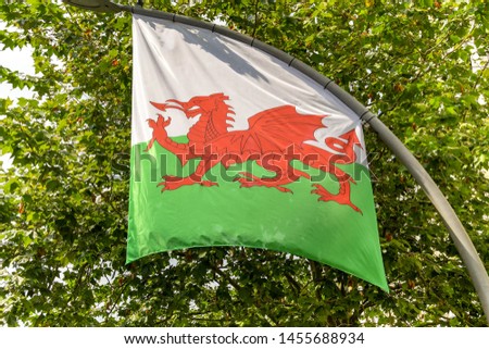 The Welsh flag, the "Red Dragon" of Wales.