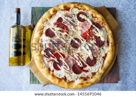 
Italian pizza on a wooden board