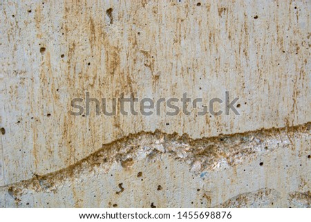 Concrete wall closeup surface texture photography with a lot of variation and different elements
