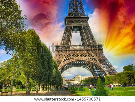 Paris, La Tour Eiffel. Summer sunset above city famous Tower.