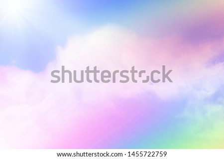 There are clouds and sky with rainbow as pastel background