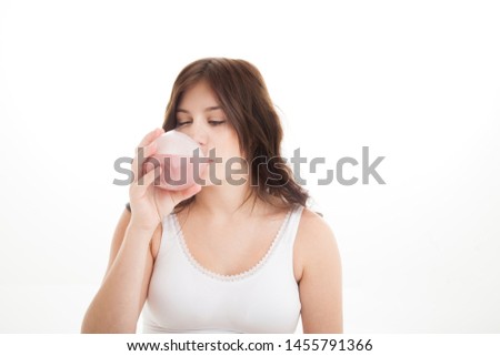 Smoothies and healthy eating while pregnant on white background
