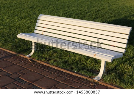 bench in the city park on the shores of the Mediterranean