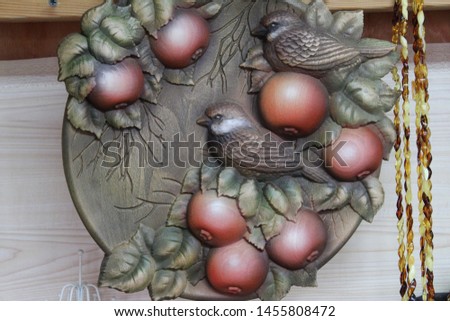 
picture of wood, with sparrows and apples