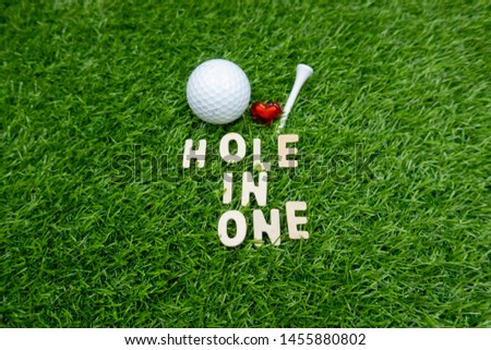 To golfer with love golf ball on green course