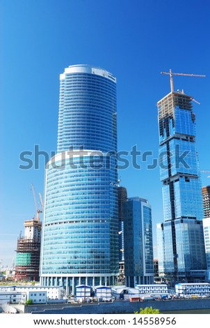 Modern office building against blue sky