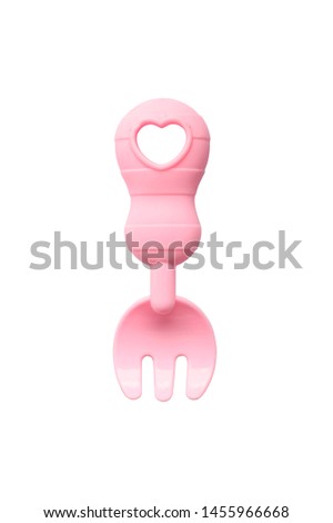 kid plastic pink fork on white background
