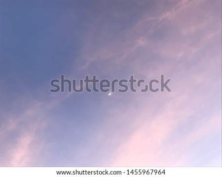 The moon with pastel sky background