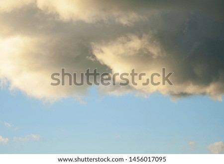 Aerial view of clouds on a background of blue clear sky. White cumulus cloud. 