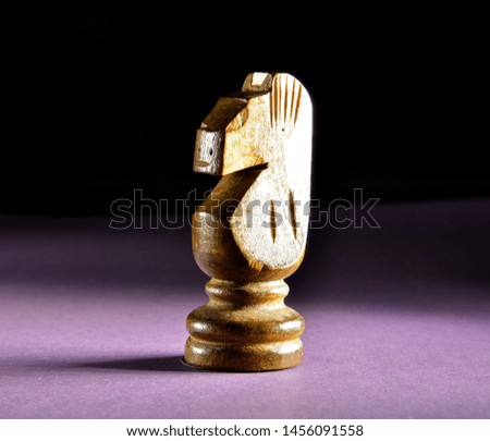chess pieces on black background
