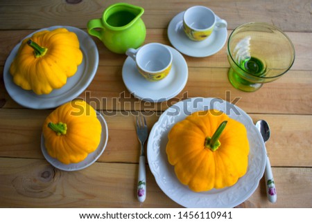 patisson squash on wooden table