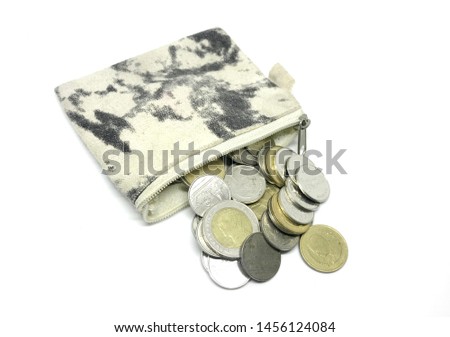 Stacking coin in wallet on white background stock photo