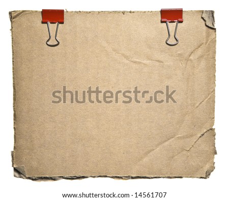 Torn Aged Cardboard With Red Clips Isolated On White Background. Ready for your message.