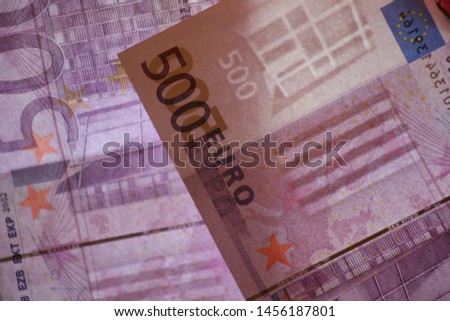 500 euro banknotes with visible watermarks.

