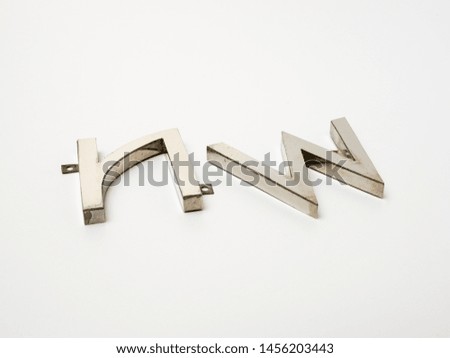 Metal letters on white background
