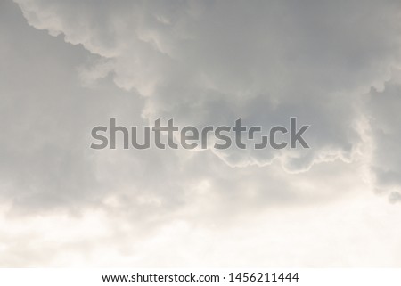 Large heavy white and gray cumulus clouds before a thunderstorm. Close-up
