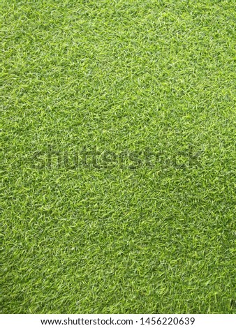 Green artificial grass pattern and background texture