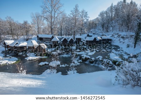 water mill with nature view in winter season